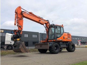 Bager na kolesih Doosan DX140W-3