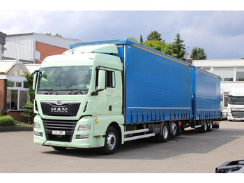 Tovornjak s ponjavo MAN TGX 26.460
