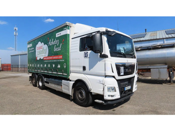 Tovornjak s ponjavo MAN TGX 26.480