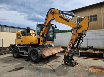 Bager na kolesih LIEBHERR A 910