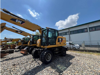 Bager na kolesih CATERPILLAR M318F