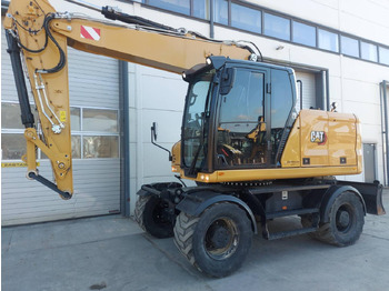 Bager na kolesih CATERPILLAR M318