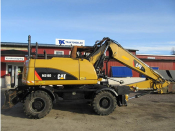 Bager na kolesih CATERPILLAR M316D