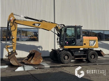 Bager na kolesih CATERPILLAR M313D