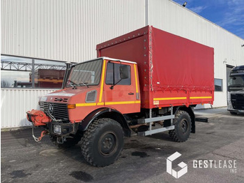Tovornjak s ponjavo UNIMOG