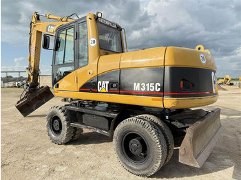 Bager na kolesih CATERPILLAR M315C