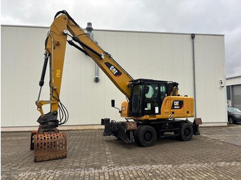 Bager za prekladanje primarnih/ Sekundarnih surovin CATERPILLAR MH3024