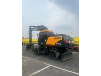 Bager na kolesih HYUNDAI R210