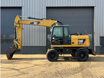 Bager na kolesih CATERPILLAR M313D