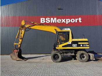 Bager na kolesih CATERPILLAR M315