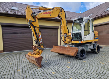 Bager na kolesih LIEBHERR A 311