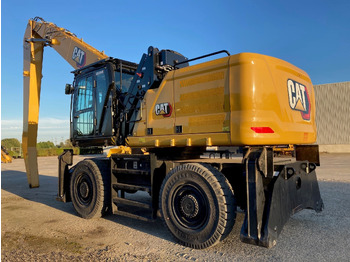 Bager za prekladanje primarnih/ Sekundarnih surovin CATERPILLAR MH3040