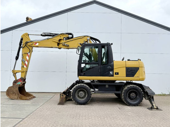 Bager na kolesih CATERPILLAR M313D