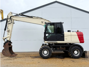 Bager na kolesih CATERPILLAR M316D