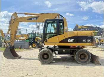Bager na kolesih CATERPILLAR M315C