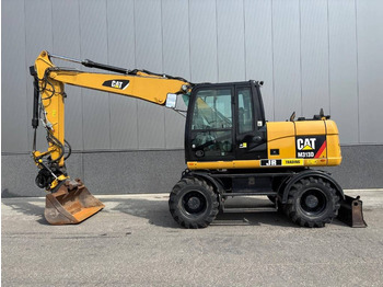 Bager na kolesih CATERPILLAR M313D