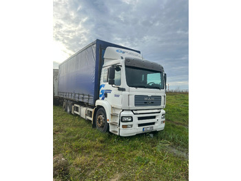 Tovornjak s ponjavo MAN TGA 26.310