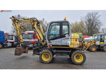 Bager na kolesih NEW HOLLAND