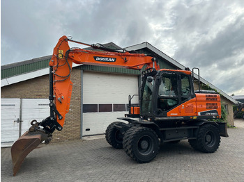 Bager na kolesih Doosan DX140W-5: slika 2