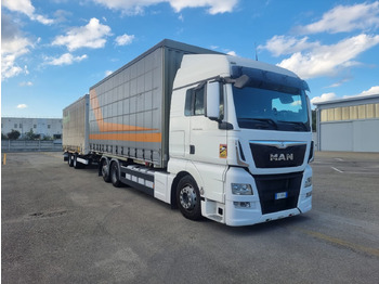 Tovornjak s ponjavo MAN TGX 26.440