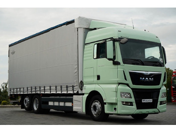 Tovornjak s ponjavo MAN TGX 26.440