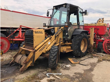 Bager nakladalec NEW HOLLAND
