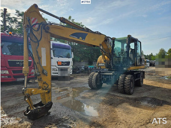 Bager na kolesih CATERPILLAR M315C