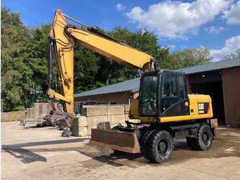 Bager na kolesih CATERPILLAR M316D