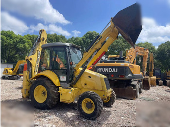 Bager nakladalec NEW HOLLAND