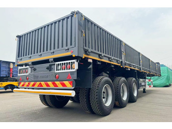 Nov Polprikolica s kesonom za transport razsutega materiala TITAN Side Wall Semi Trailer for Sale in Tanzania: slika 3 Nov Polprikolica s kesonom za transport razsutega materiala TITAN Side Wall Semi Trailer for Sale in Tanzania: slika 3