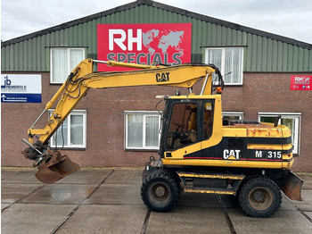 Bager na kolesih CATERPILLAR M315