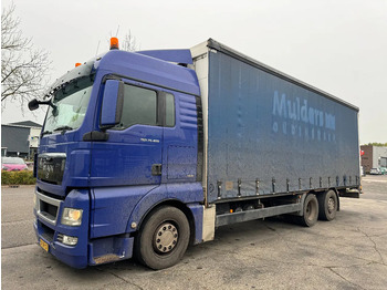 Tovornjak s ponjavo MAN TGX 26.400