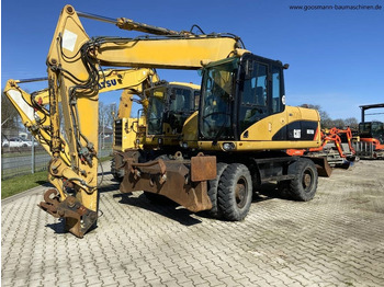 Bager na kolesih CATERPILLAR M315D