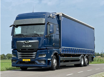 Tovornjak s ponjavo MAN TGX 26.400