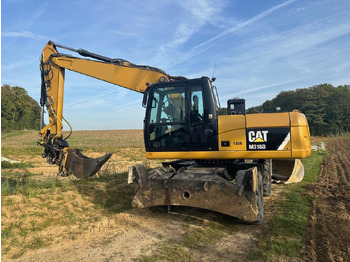 Bager na kolesih CATERPILLAR M316D