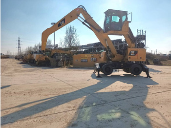 Bager na kolesih CATERPILLAR MH3022