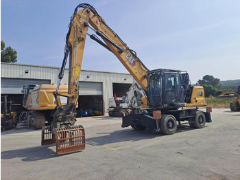 Bager na kolesih CATERPILLAR MH3024