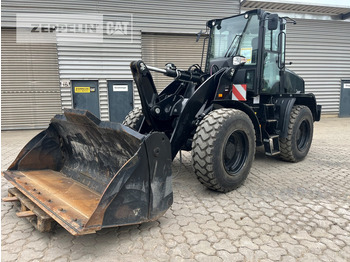 Kolesni nakladalec CATERPILLAR 910