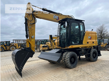 Bager na kolesih CATERPILLAR M314