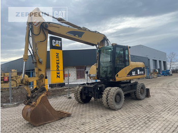 Bager na kolesih CATERPILLAR M316C