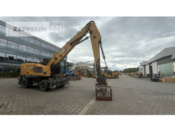 Bager za prekladanje primarnih/ Sekundarnih surovin CATERPILLAR MH3022