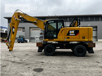 Bager za prekladanje primarnih/ Sekundarnih surovin CATERPILLAR MH3022
