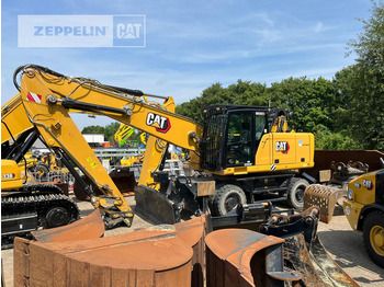 Bager za prekladanje primarnih/ Sekundarnih surovin CATERPILLAR MH3024