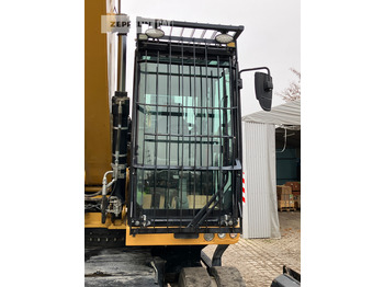 Bager za prekladanje primarnih/ Sekundarnih surovin CATERPILLAR MH3024