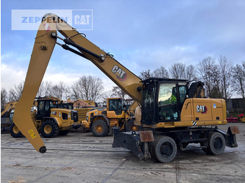 Bager za prekladanje primarnih/ Sekundarnih surovin CATERPILLAR MH3024