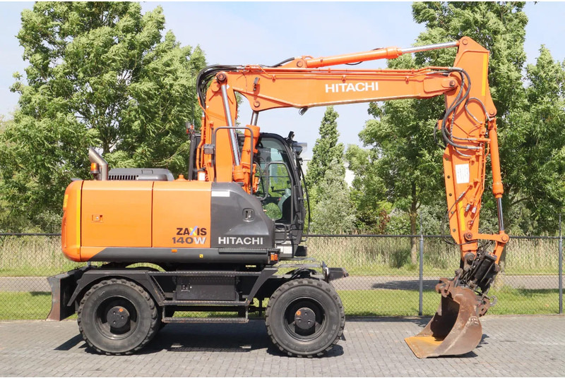 Hitachi ZX 140 W-5B | TILT QC | BUCKET | DOZER BLADE | DUTCH REG. - Bager na kolesih: slika 4 Hitachi ZX 140 W-5B | TILT QC | BUCKET | DOZER BLADE | DUTCH REG. - Bager na kolesih: slika 4
