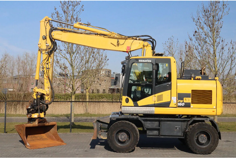 Komatsu PW160-11 | ENGCON TILTROTATOR | BUCKET | TRAILER HYDR. - Bager na kolesih: slika 1 Komatsu PW160-11 | ENGCON TILTROTATOR | BUCKET | TRAILER HYDR. - Bager na kolesih: slika 1