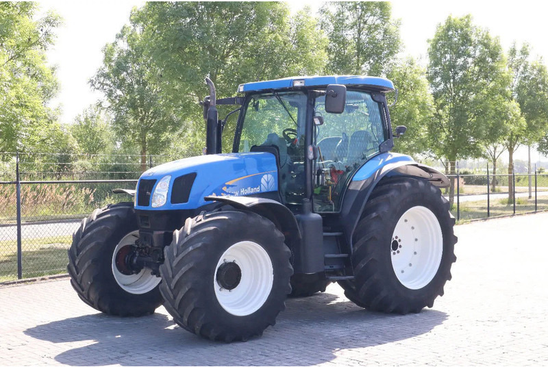 New Holland TS135A | 40 KM/H | 4X4 | SUPERSTEER - Traktor: slika 1 New Holland TS135A | 40 KM/H | 4X4 | SUPERSTEER - Traktor: slika 1