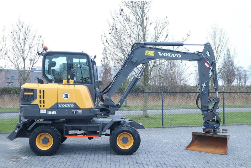 Volvo EW 60 E | DEMO | 30 KM/H | ROTOTILT + GRIPPER | BUCKET - Bager na kolesih: slika 4 Volvo EW 60 E | DEMO | 30 KM/H | ROTOTILT + GRIPPER | BUCKET - Bager na kolesih: slika 4