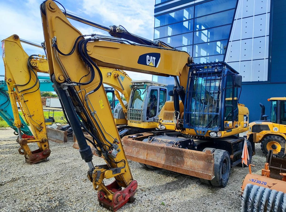 Caterpillar M318D MH - Bager na kolesih: slika 2 Caterpillar M318D MH - Bager na kolesih: slika 2